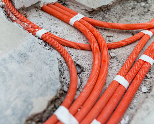 Floor with corrugated pipes for electrical installation.